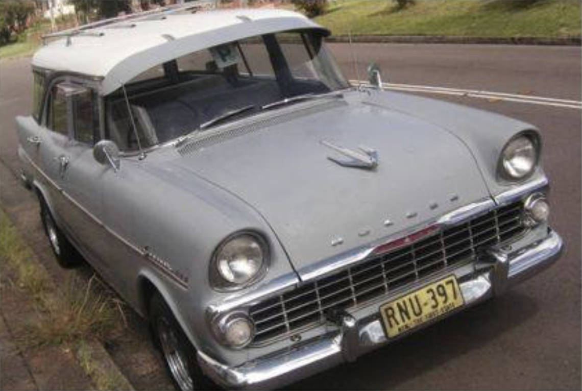 EK Holden in Snowcrest White over Montana Grey — Special Station Sedan