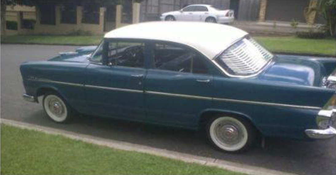 EK Holden in Snowcrest White over Argosy Turquoise — Special Sedan