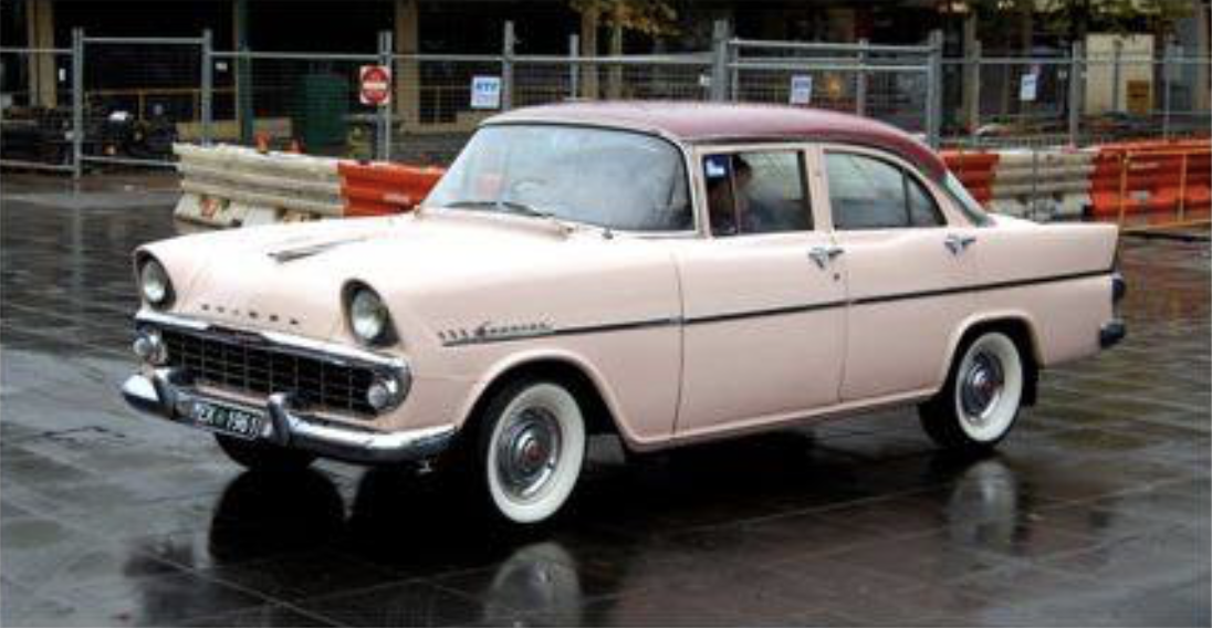 EK Holden in Dusk Plum over Barrier Coral — Special Sedan