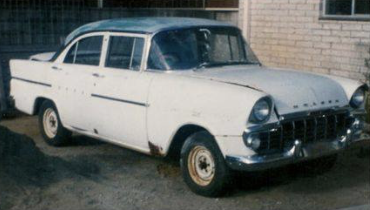 EK Holden in Twilight Turquoise over Snowcrest White — Special Sedan