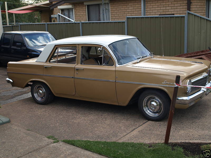 EH Holden in Fowlers Ivory over Kalgoorlie Gold — Special Sedan