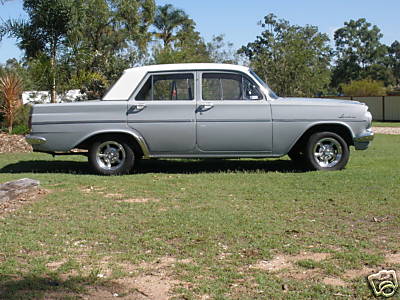 EH Holden in Fowlers Ivory over Mallacoota Grey — Special Sedan