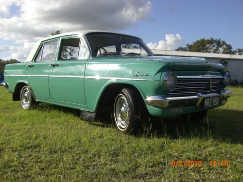 EH Holden in Fowlers Ivory over Mitta Green — Special Sedan