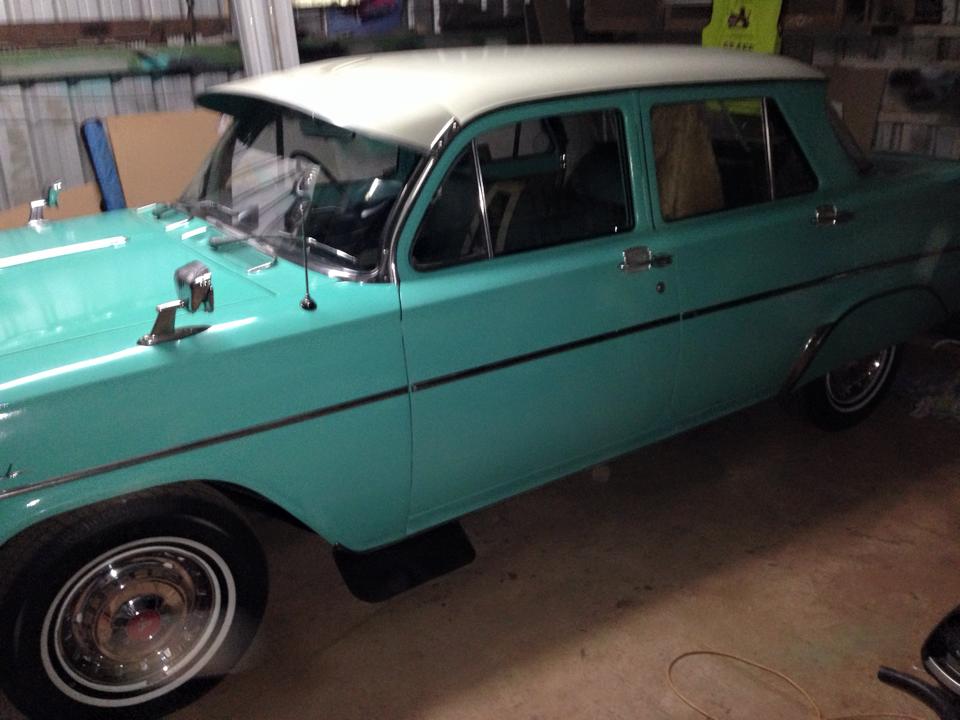 EJ Holden in Atherton Ivory over Tamar Turquoise — Special Sedan