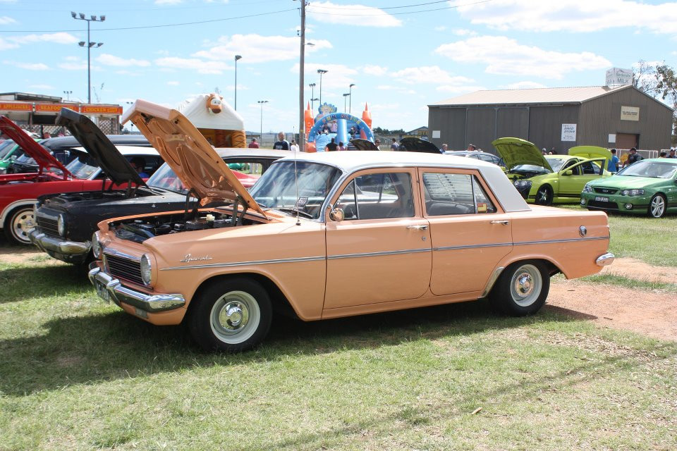 EH Holden in Fowlers Ivory over Quandong (peach) — Special Sedan