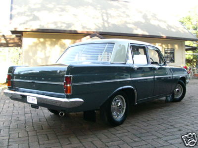 EH Holden in Fowlers Ivory over Morwell Grey — Special Sedan
