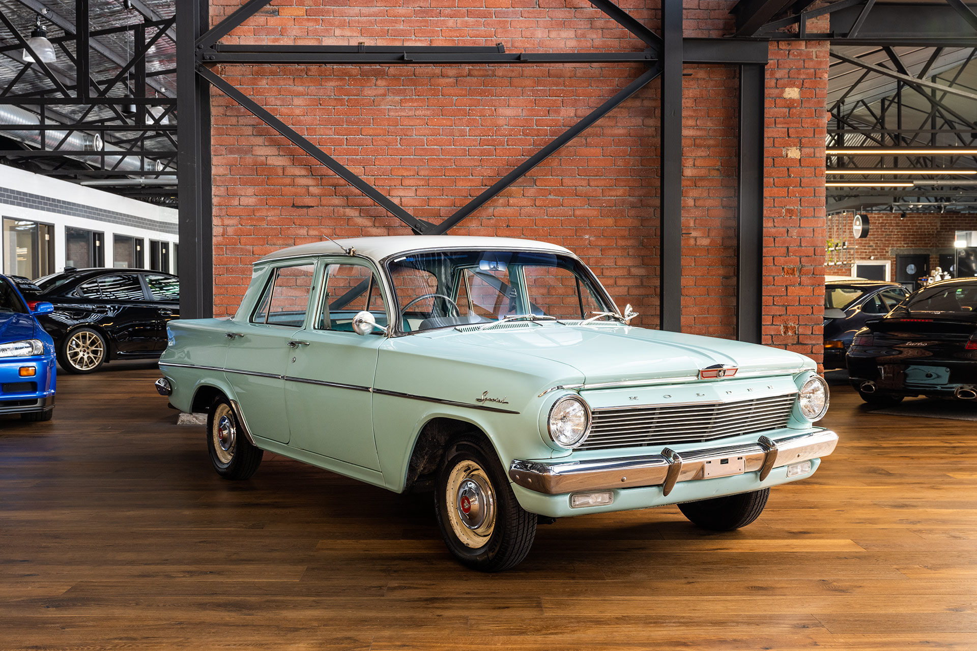 EJ Holden in Atherton Ivory over Benalla Turquoise — Special Sedan