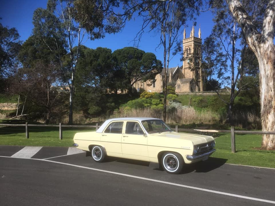 HR Holden in Grecian White over Jervois Cream — Special Sedan