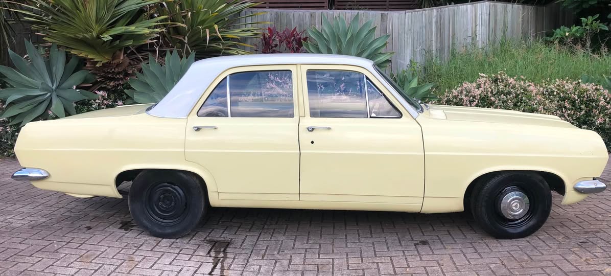 HR Holden in Grecian White over Jervois Cream — Special Sedan