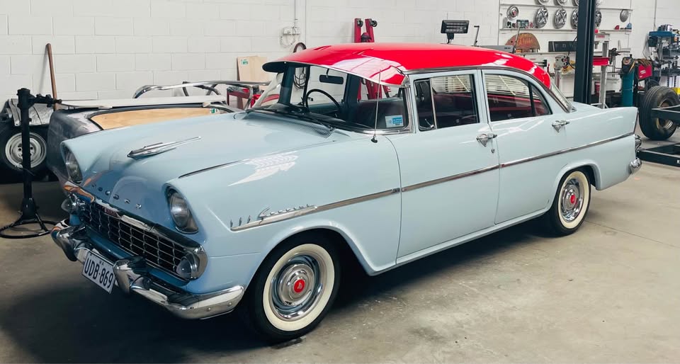 EK Holden in Grenadier Red over Cataract Grey — Special Sedan