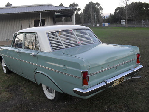 EH Holden in Fowlers Ivory over Saltbush Green — Special Sedan