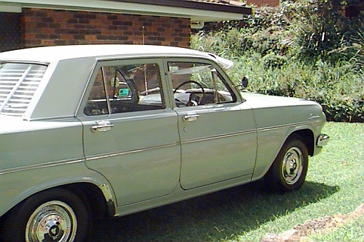 EH Holden in Fowlers Ivory over Saltbush Green — Special Sedan