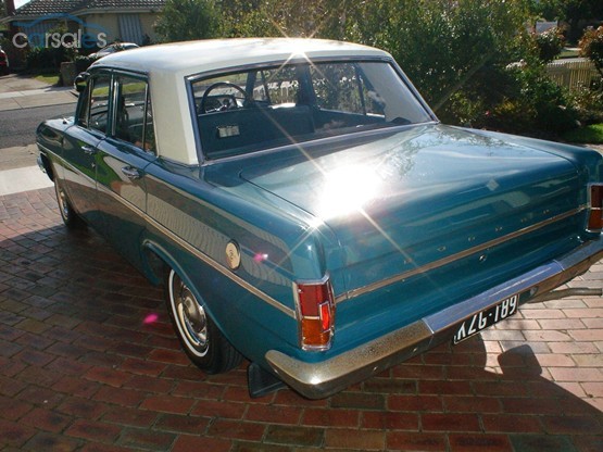 EH Holden in Fowlers Ivory over Wandana Turquoise — Special Sedan