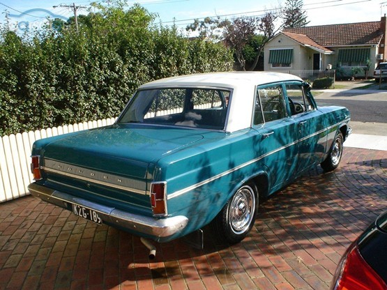 EH Holden in Fowlers Ivory over Wandana Turquoise — Special Sedan