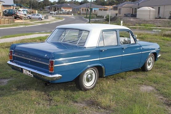 EH Holden in Fowlers Ivory over Eden Blue — Special Sedan