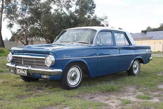EH Holden in Fowlers Ivory over Eden Blue — Special Sedan