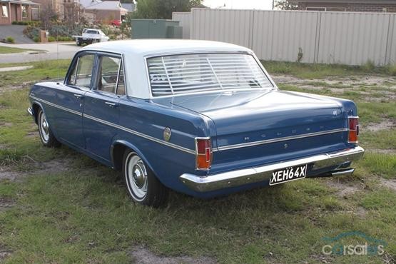 EH Holden in Fowlers Ivory over Eden Blue — Special Sedan