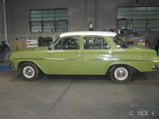 EJ Holden in Atherton Ivory over Sepik Green — Special Sedan - Manual Transmission