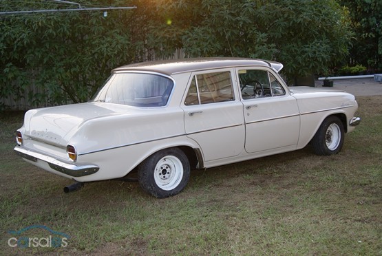 EJ Holden in Bunyip Bronze over Katherine Beige — Special Sedan - Manual Transmission