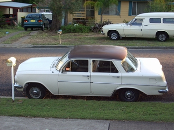 EJ Holden in Bunyip Bronze over Katherine Beige — Special Sedan - Manual Transmission
