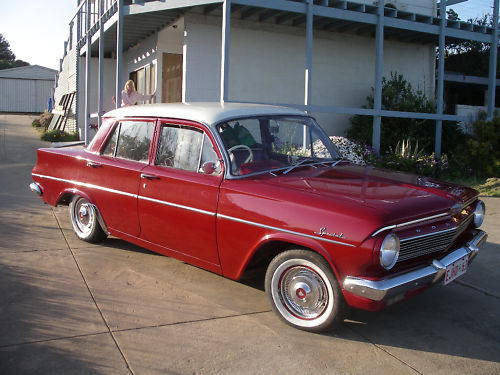 EJ Holden in Atherton Ivory over Namatjira Red — Special Sedan - Manual Transmission