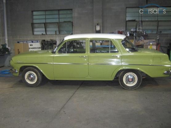 EJ Holden in Atherton Ivory over Sepik Green — Special Sedan - Manual Transmission