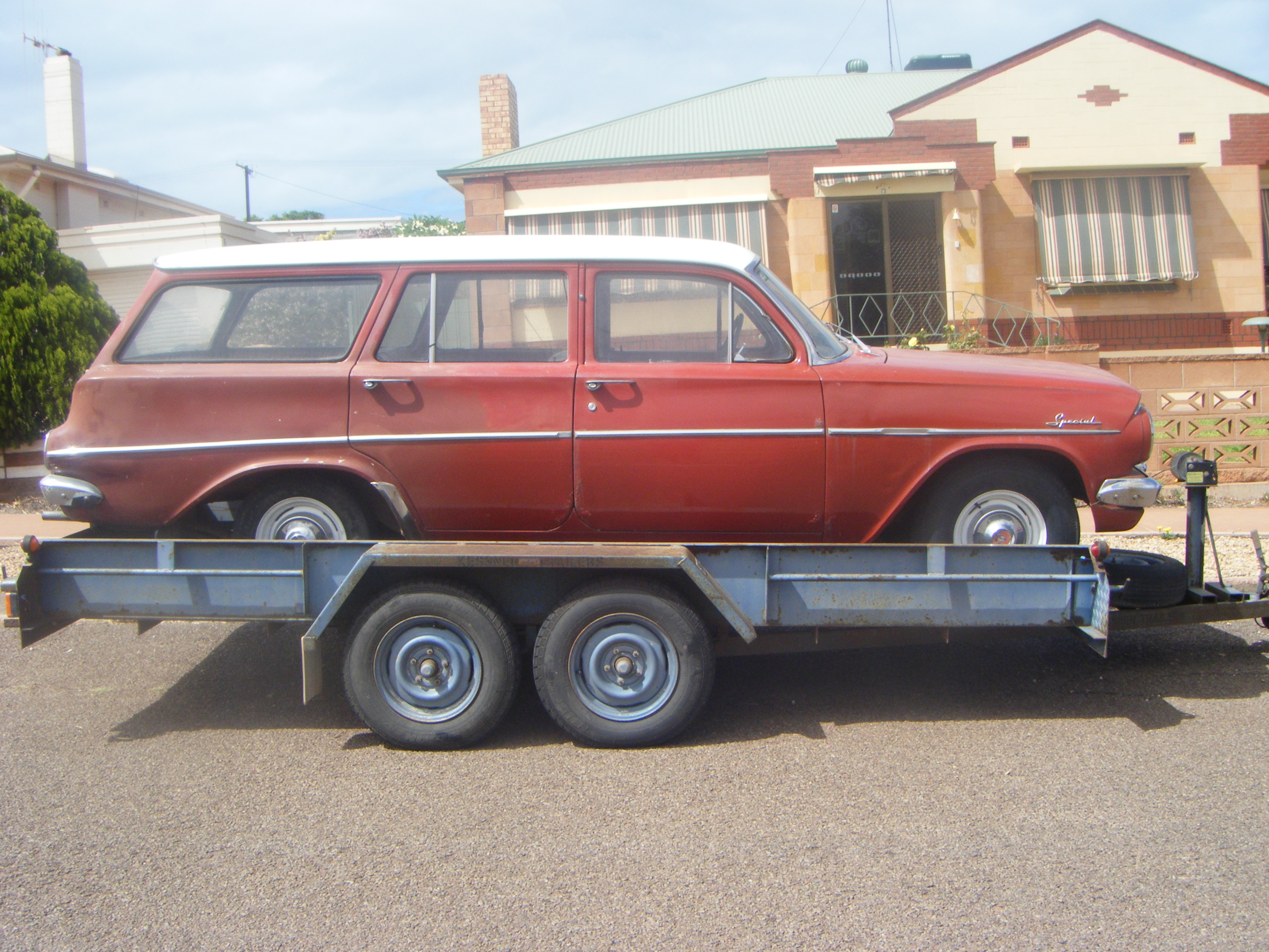 EJ Holden in Atherton Ivory over Namatjira Red — Special Station Sedan - Manual Transmission