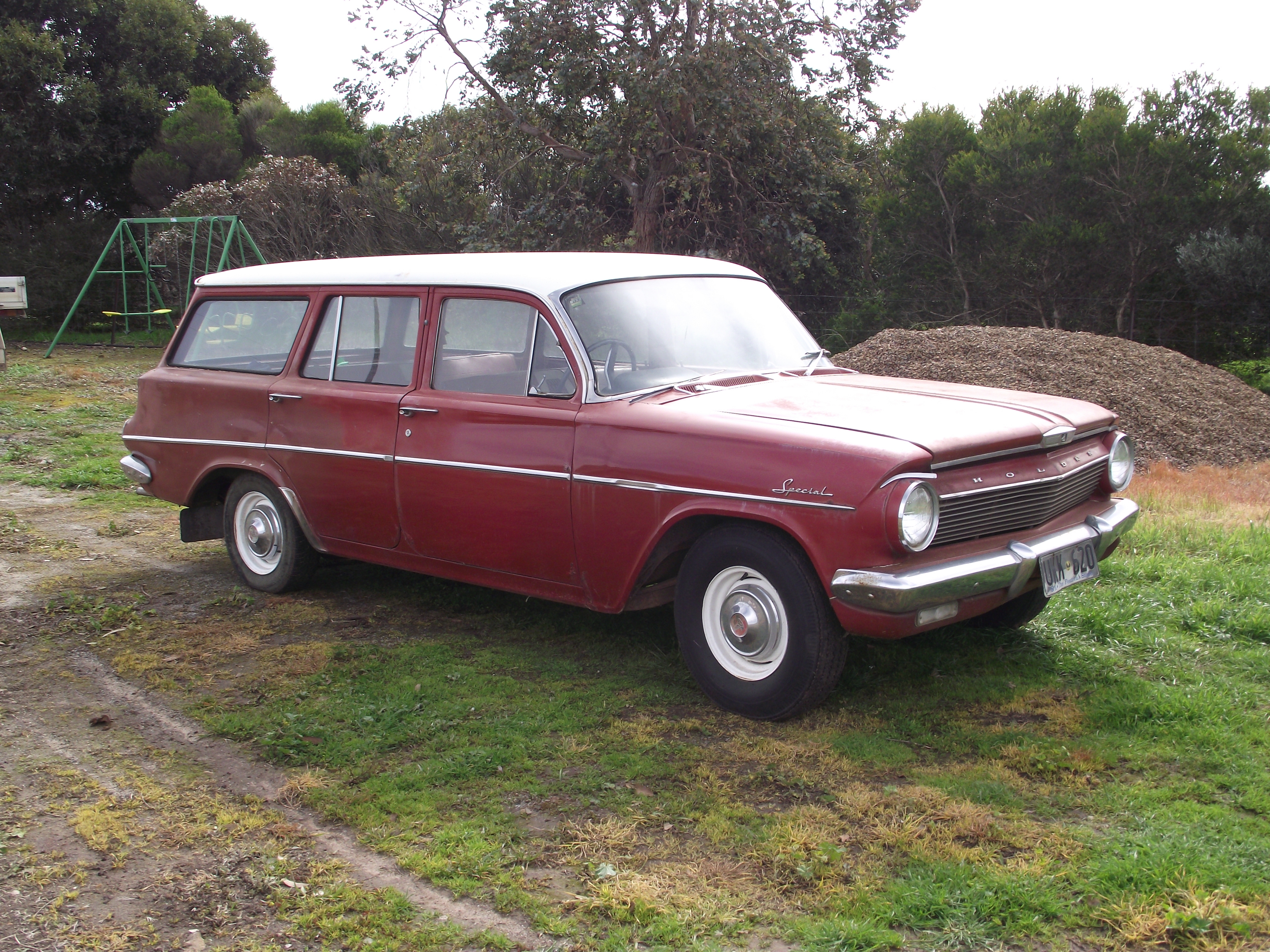 EJ Holden in Atherton Ivory over Namatjira Red — Special Station Sedan - Manual Transmission
