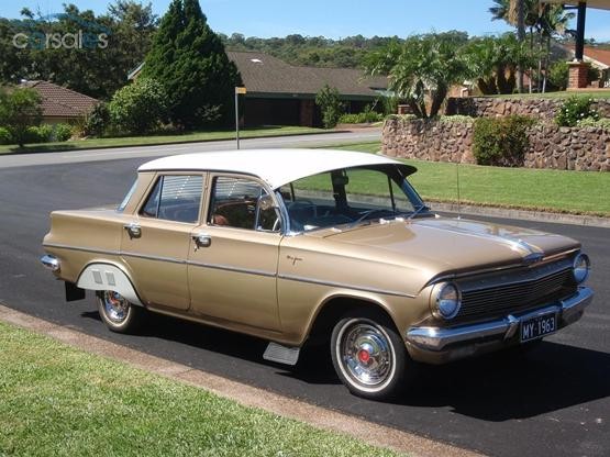 EJ Holden in Atherton Ivory over Euroa Gold Met — Premier Sedan