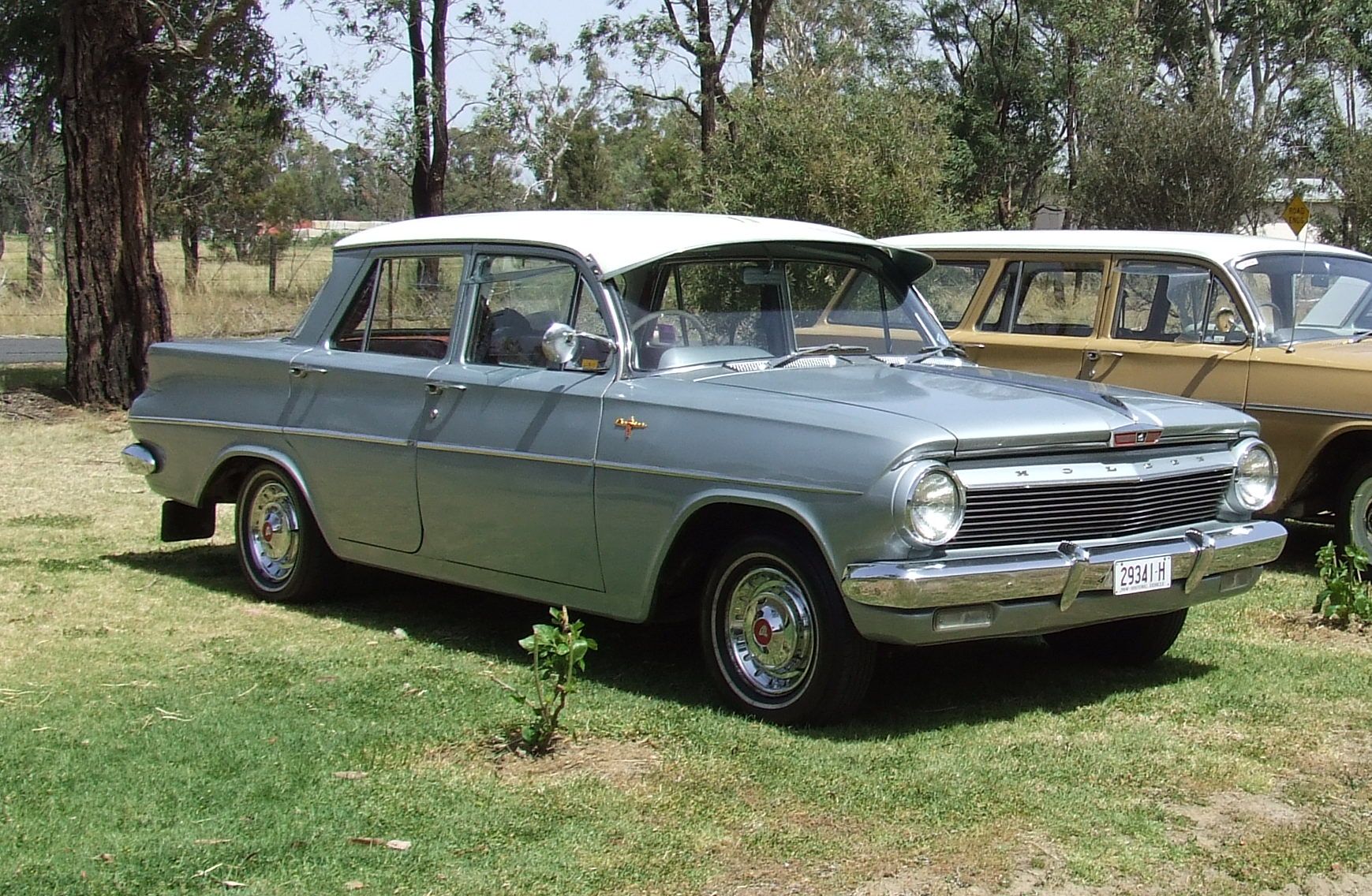 EJ Holden in Atherton Ivory over Theatre Grey Met — Premier Sedan