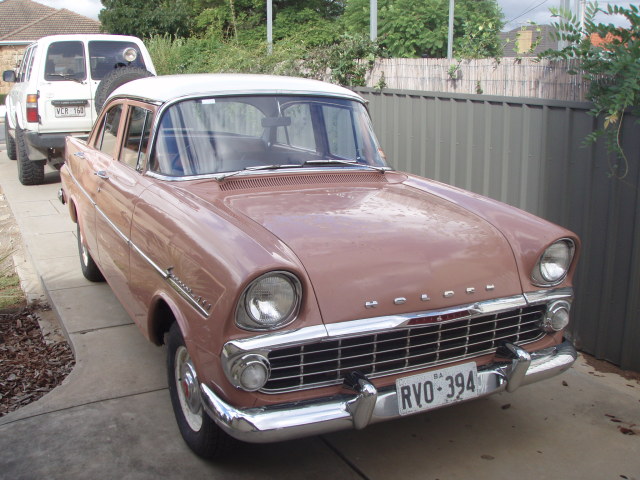 EK Holden in Snowcrest White over Egyptian Tan — Special Sedan