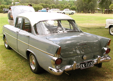 EK Holden in Snowcrest White over Garrison Grey — Special Sedan