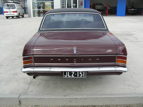 HD Holden in Egmont Maroon Met — Premier Sedan