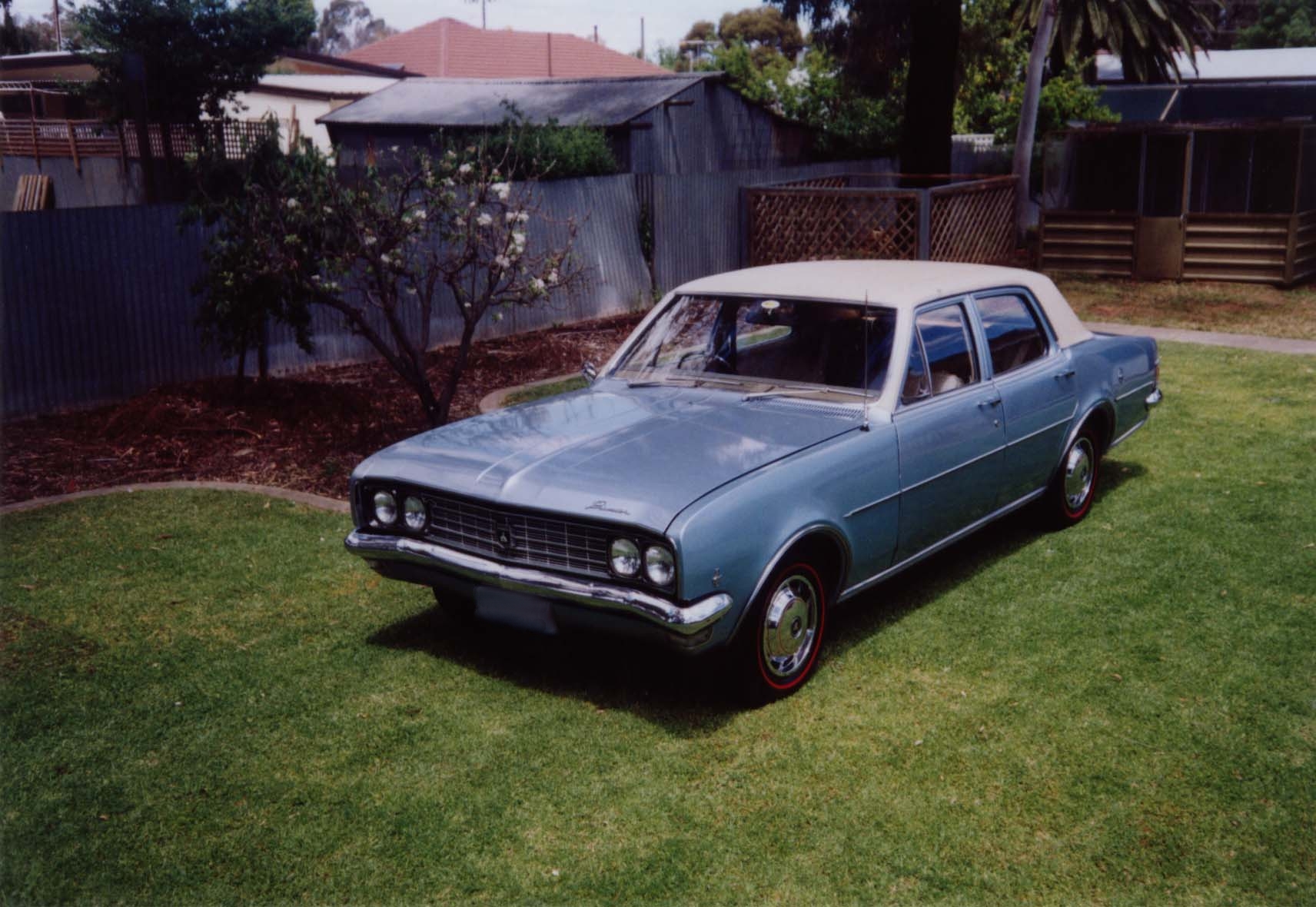 HG Holden in Kashmir White over Electra Blue Met — Premier Sedan