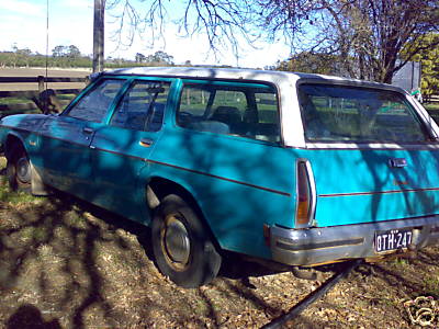 HJ Holden in Cotillion White over Aquarius — Kingswood Station Wagon