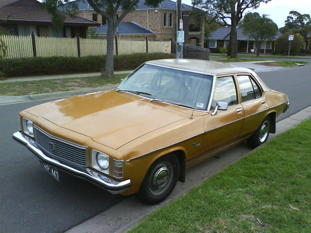 HJ Holden in Antelope Met over Contessa Gold Met — Kingswood Deluxe Sedan