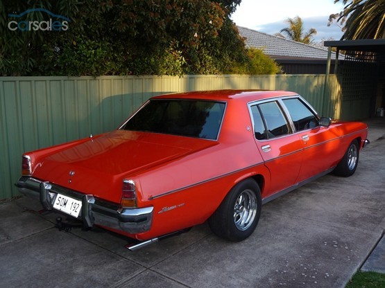 HJ Holden in Mandarin Red — Statesman DeVille Sedan