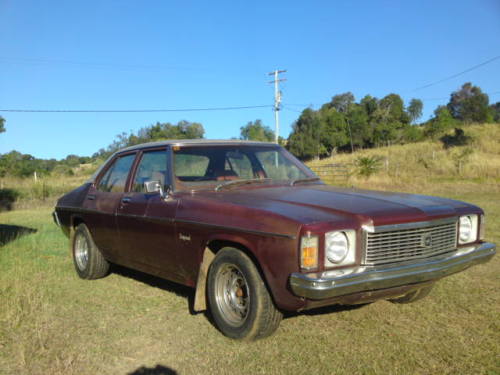 HJ Holden in Antelope Met over Claret Met — Kingswood Vacationer Sedan