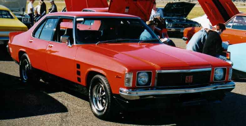 HJ Holden in Mandarin Red — Monaro GTS Sedan