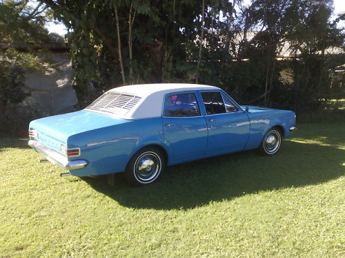 HK Holden in Ermine White over Mako Blue — Kingswood  Sedan