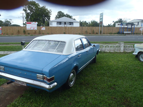 HK Holden in Ermine White over Mako Blue — Kingswood  Sedan