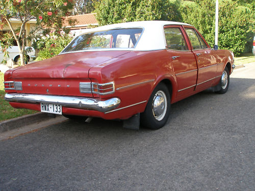 HK Holden in Ermine White over Picardy Red — Kingswood  Sedan