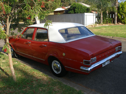 HK Holden in Ermine White over Picardy Red — Kingswood  Sedan