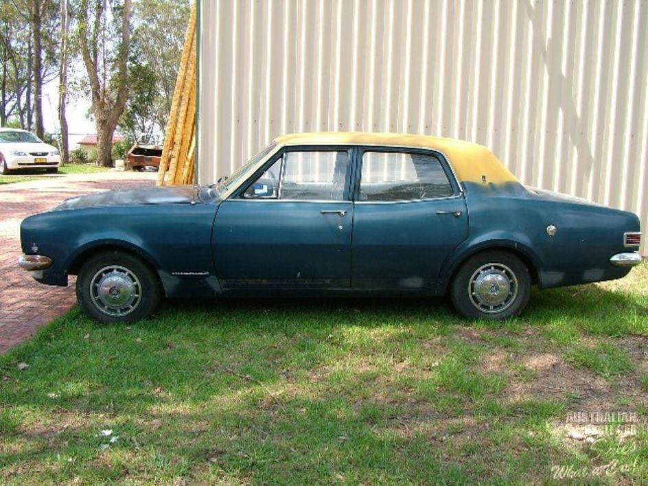 HK Holden in Grecian White over Paragon Blue Met — Premier Sedan