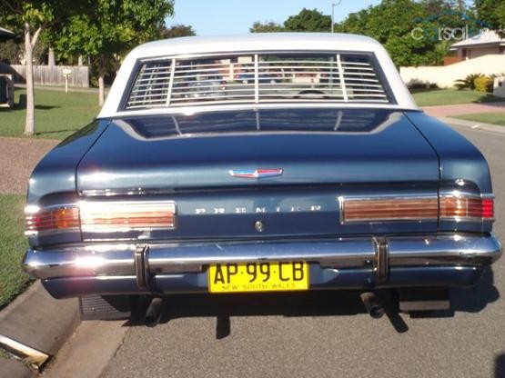 HK Holden in Grecian White over Paragon Blue Met — Premier Sedan
