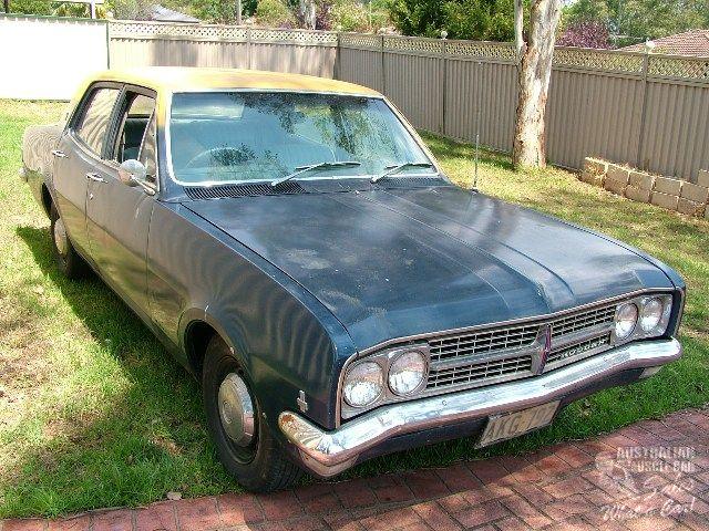 HK Holden in Grecian White over Paragon Blue Met — Premier Sedan