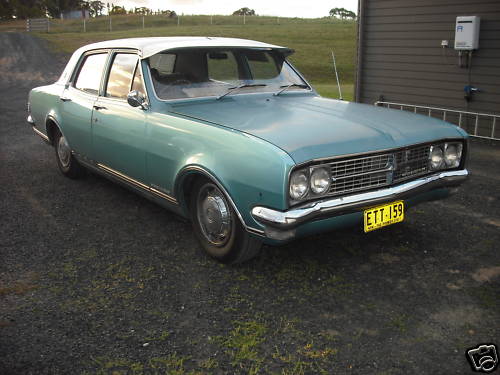 HK Holden in Grecian White over Tennyson Turquoise Met — Premier Sedan