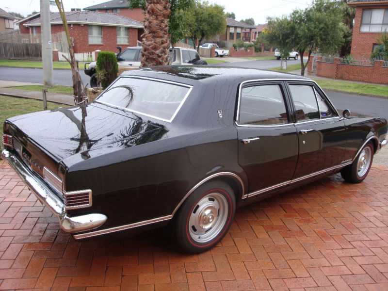 HK Holden in Warrigal Black — Premier Sedan