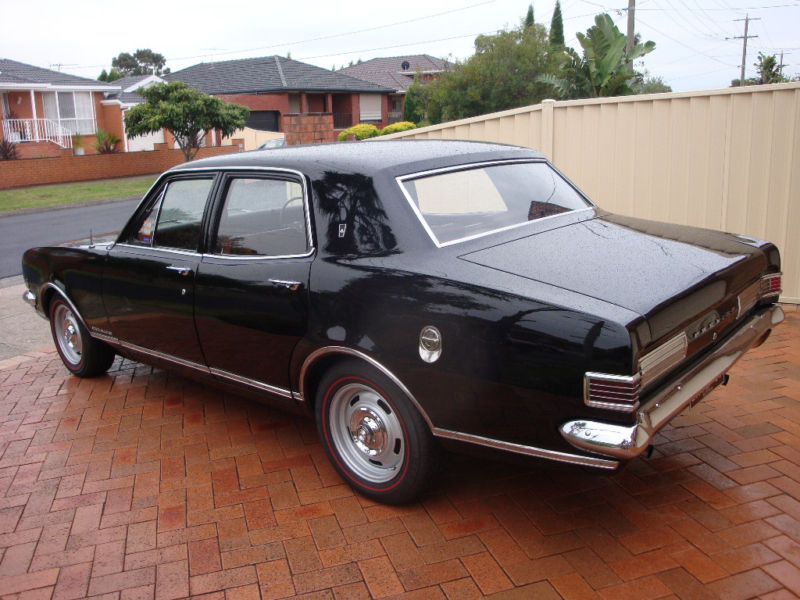 HK Holden in Warrigal Black — Premier Sedan