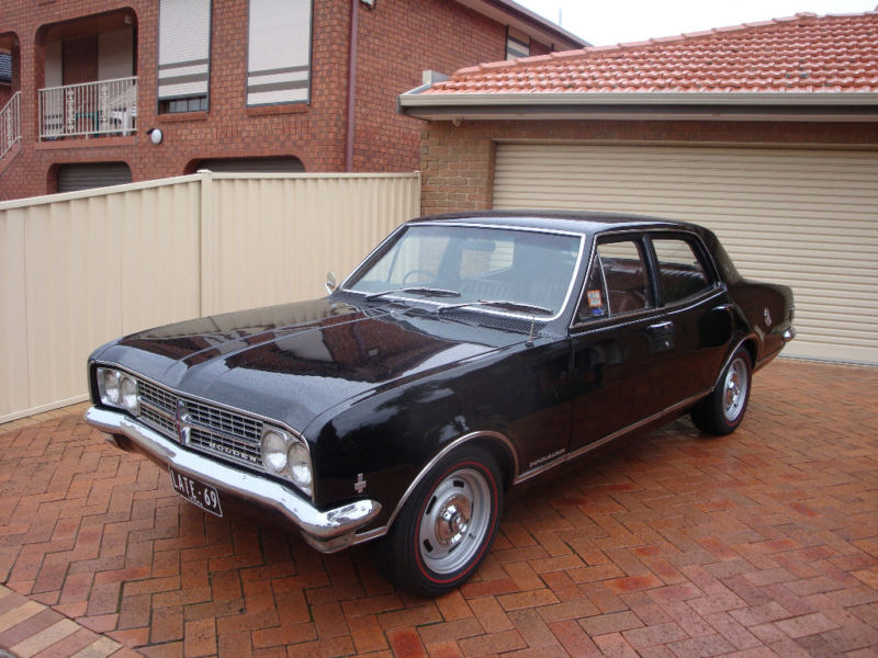 HK Holden in Warrigal Black — Premier Sedan